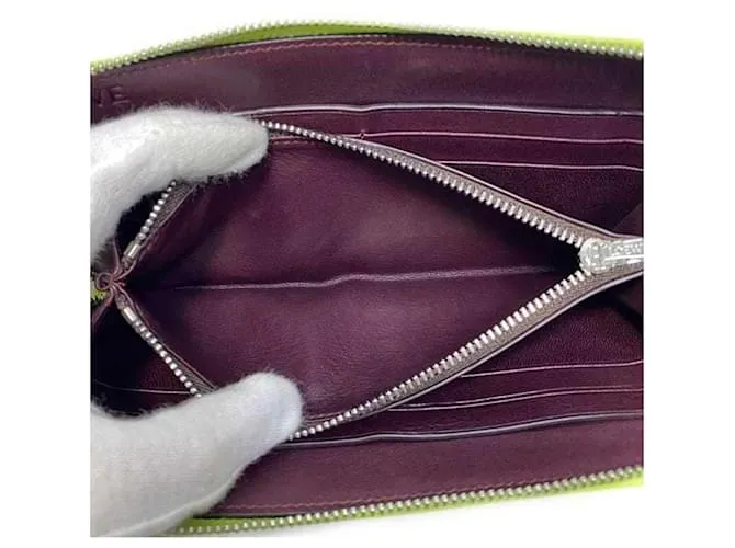 Cartera larga redonda Loewe en amarillo y burdeos 