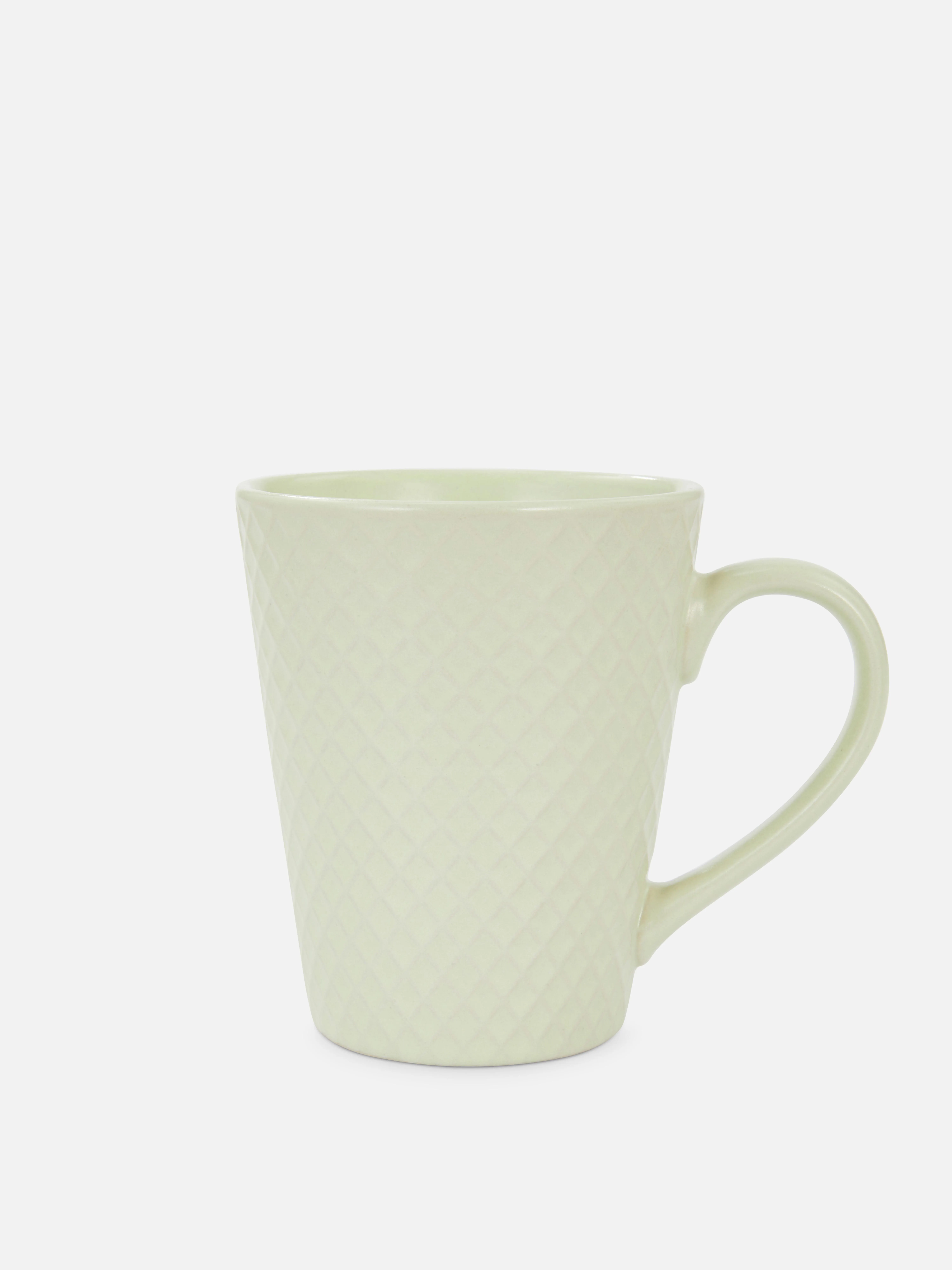 Taza de desayuno con relieve