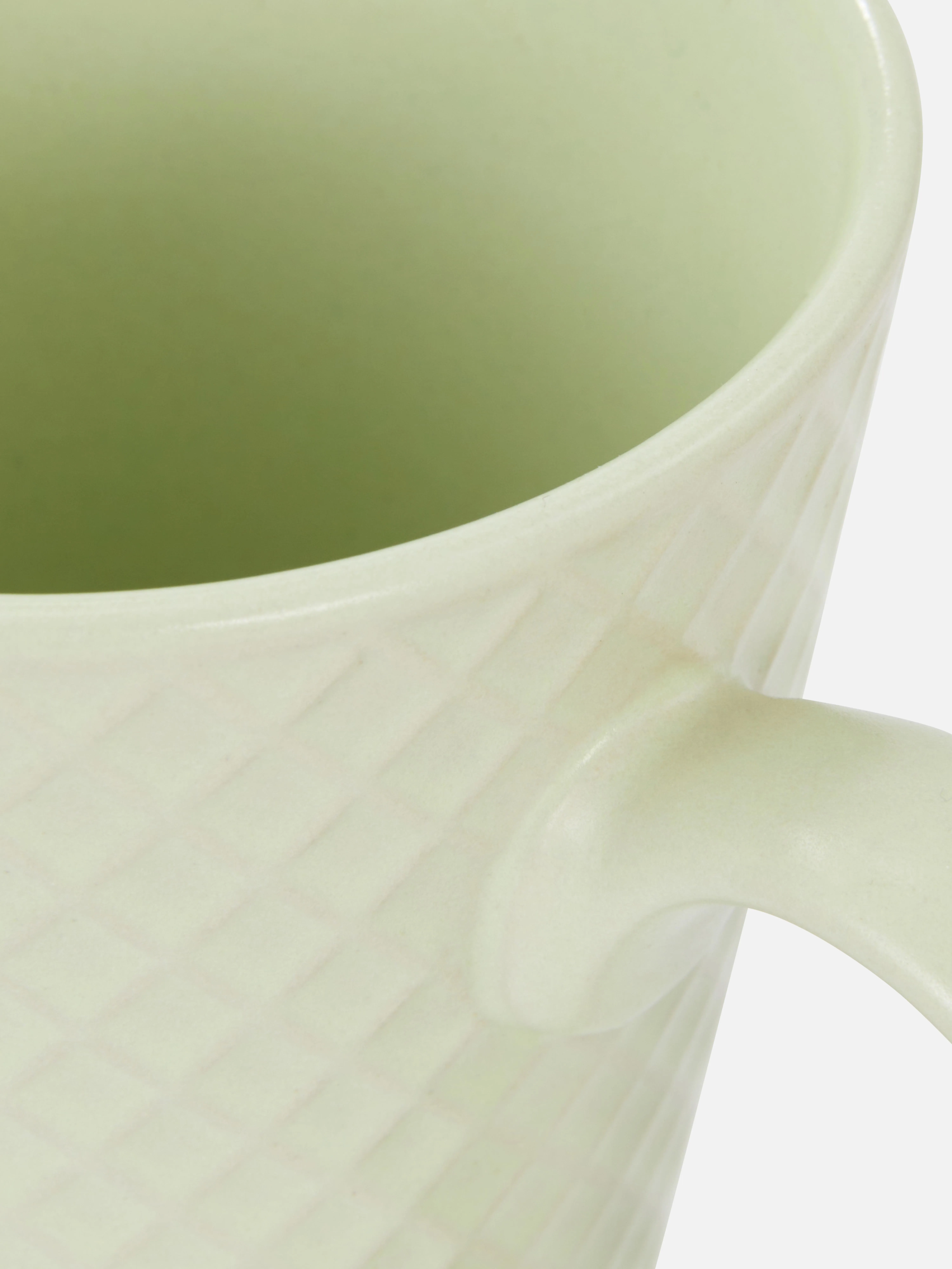 Taza de desayuno con relieve